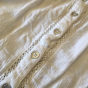 An all white crop top